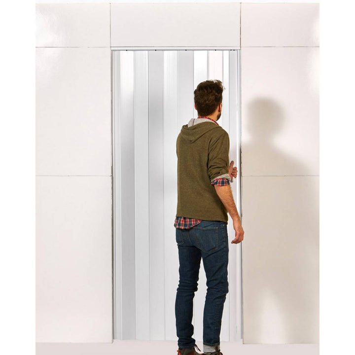 man with Everpanel Accordion Door Kit
