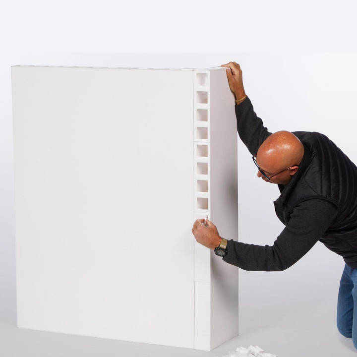 man fixing single wall kit